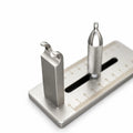 Slingshot band tying jig close-up — forked band post and knurled sliding pouch post